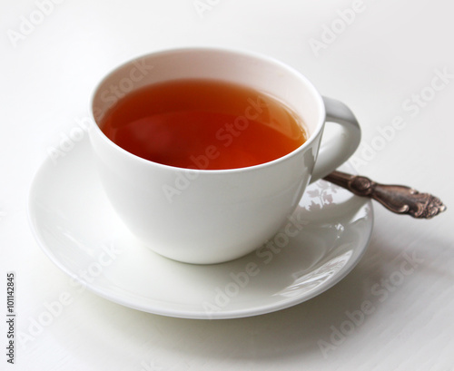 cup of tea with a spoon