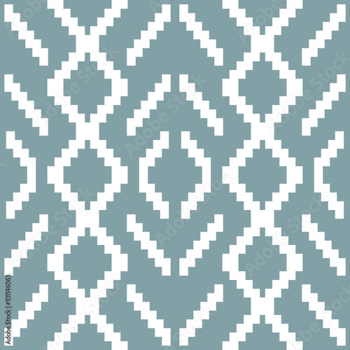 Seamless knitted pattern in white and muted blue colors