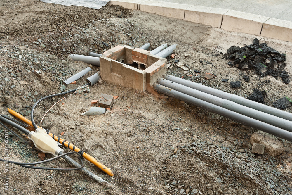 Strassenbau Kabel und Leerrohr und ein neuer Kabelschacht Stock Photo Adobe Stock Strassenbau Kabel und Leerrohr und ein neuer Kabelschacht Stock Photo Adobe Stock