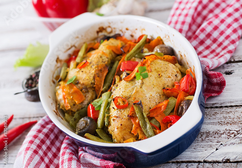 Baked, diet and healthy a chicken fillet with vegetables.