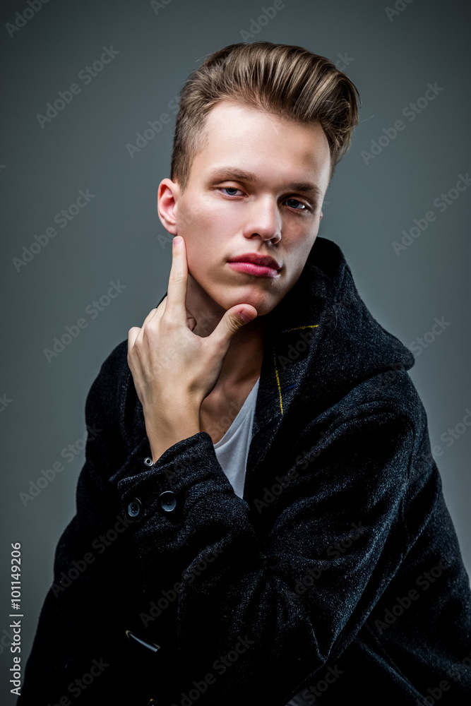Portrait of smiling young hipster male model Portrait of smiling young hipster male model