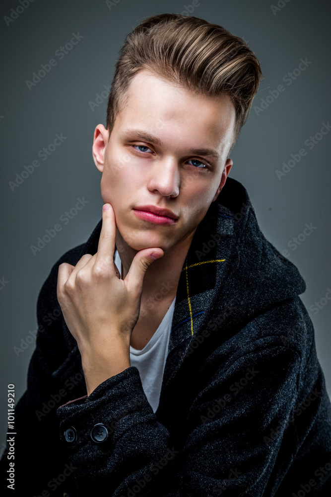 Portrait of smiling young hipster male model Portrait of smiling young hipster male model