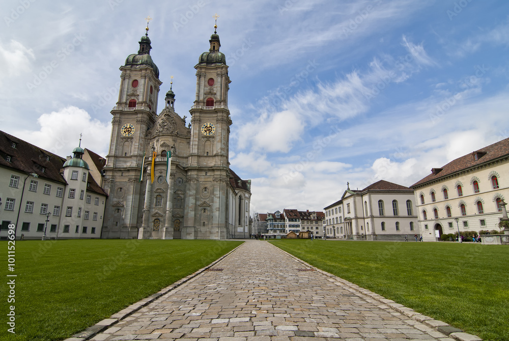 St. Gallen Cathedral / St. Gallen, Switzerland - April 23, 2012: The Cathedral of Saint Gallen in Switzerland. A wide angle view showing the gardens and the abbeys in a sunny springtime day. St. Gallen Cathedral / St. Gallen, Switzerland - April 23, 2012: The Cathedral of Saint Gallen in Switzerland. A wide angle view showing the gardens and the abbeys in a sunny springtime day.