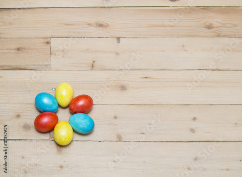 easter eggs on wood background