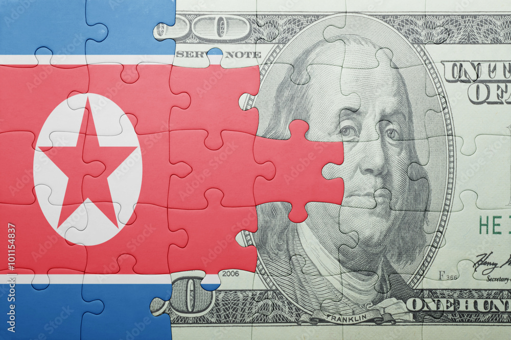 puzzle with the national flag of north korea and dollar banknote