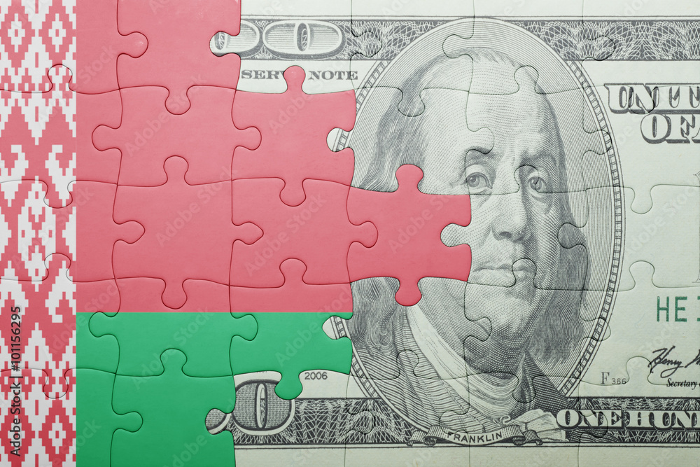 puzzle with the national flag of belarus and dollar banknote