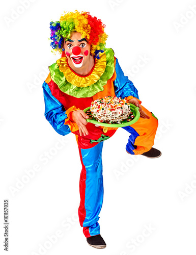 Portrait of happy birthday clown holding bunch of colour balloons.  Isolated.