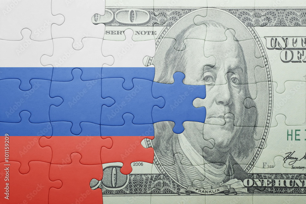 puzzle with the national flag of russia and dollar banknote