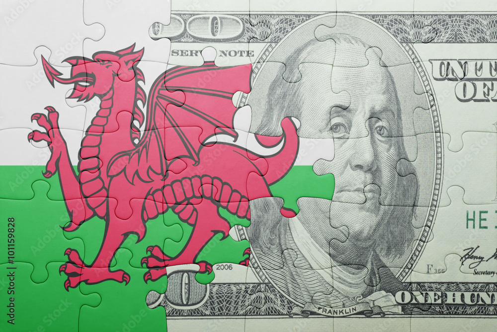 puzzle with the national flag of wales and dollar banknote
