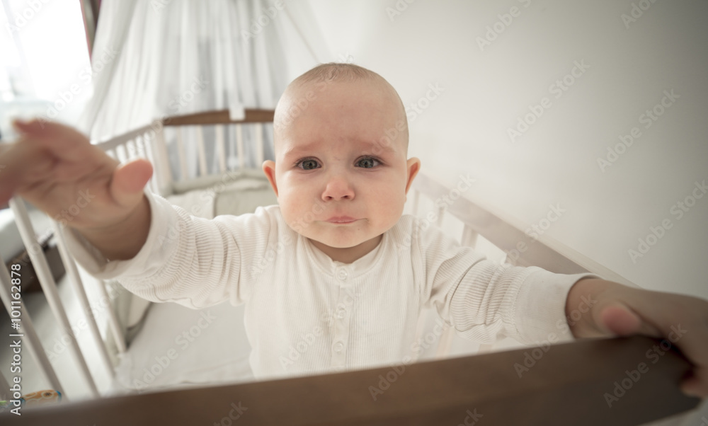 small abandoned baby in the crib crying small abandoned baby in the crib crying