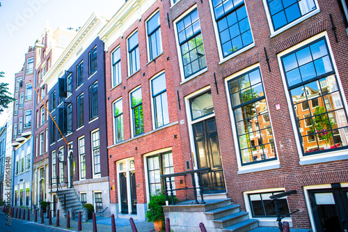 Traditional dutch buildings and blocks of flats in in old Amsterdam, Netherlands