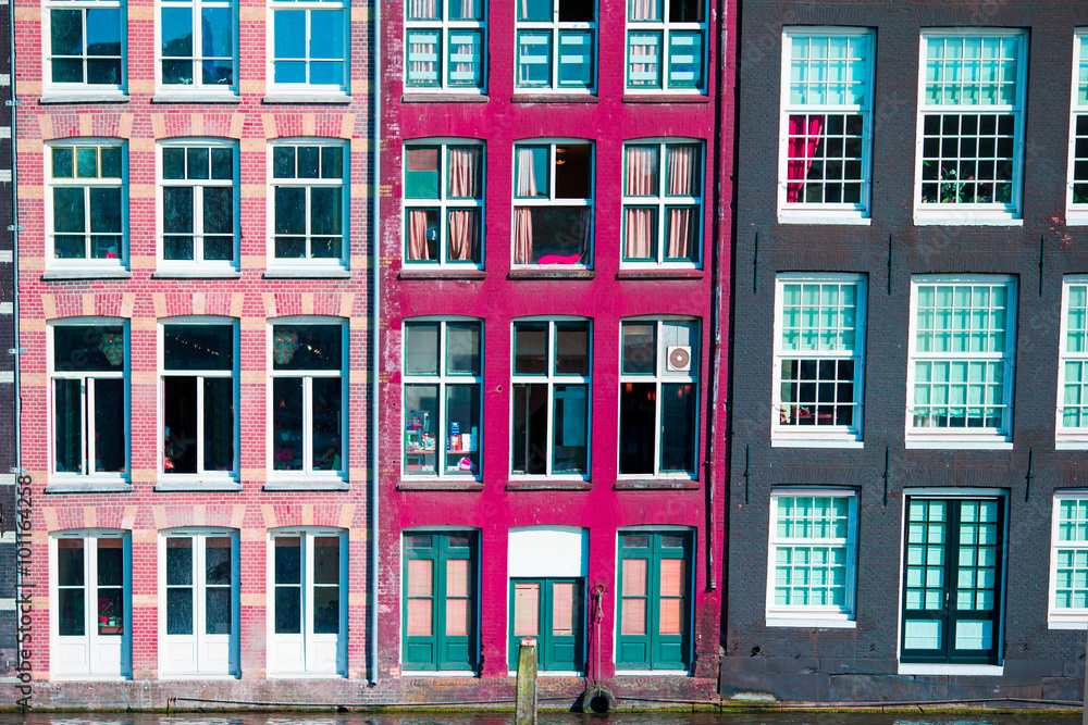 Naklejka premium Traditional dutch medieval houses in Amsterdam, Netherlands