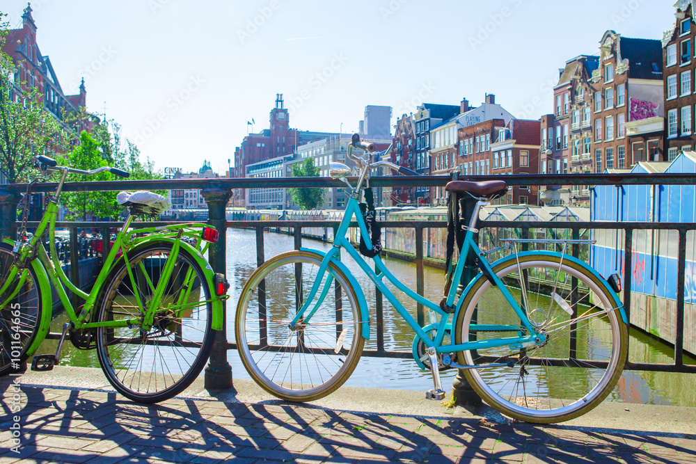 Colorful bikes on the bridge in Amsterdam, Netherlands
