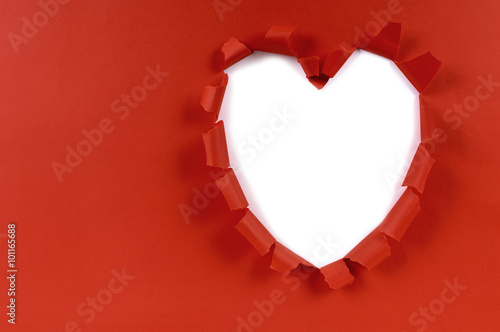 Red valentine heart shape torn paper card white background copy space photo