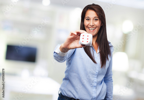 happy young-woman with dice
