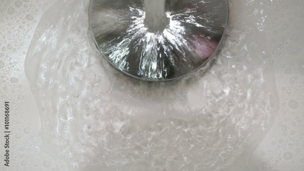 a strong stream of water from the faucet a strong stream of water from the faucet