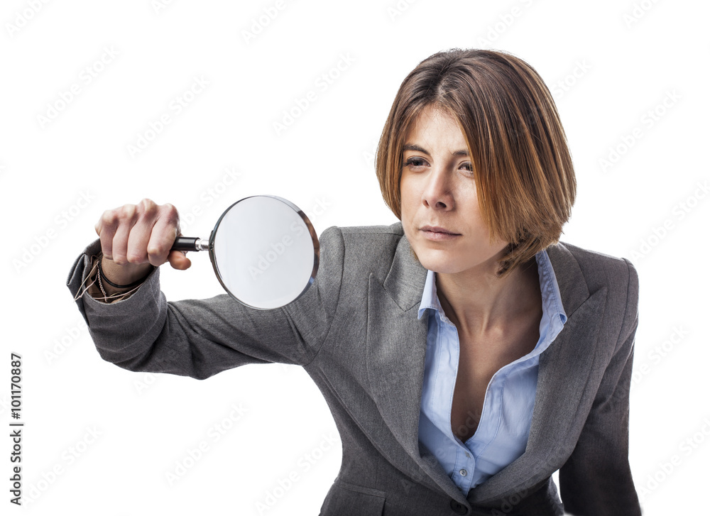 portrait of an executive young woman looking through a magnifying glass portrait of an executive young woman looking through a magnifying glass