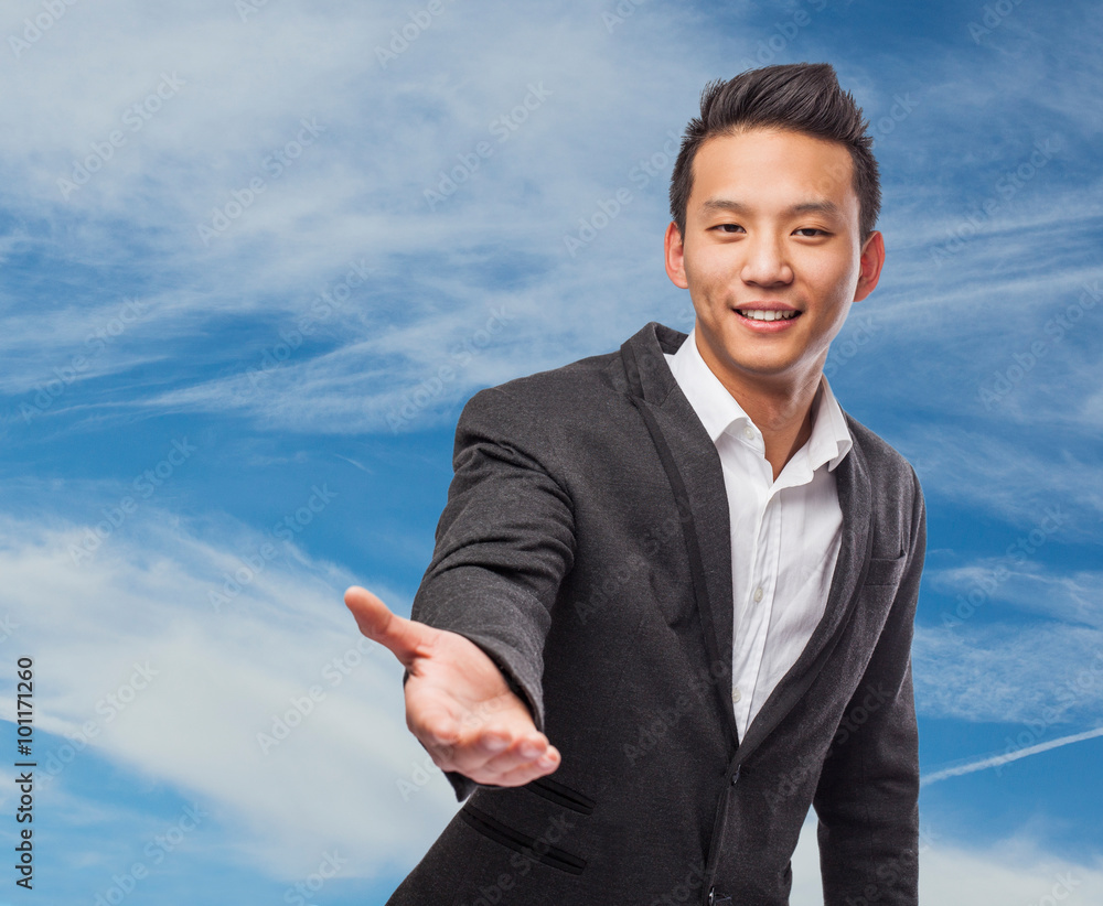 Handsome young business asian man offering help Handsome young business asian man offering help