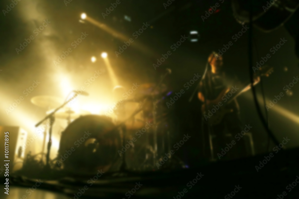Guitarist plays on rock concert, unfocused Guitarist plays on rock concert, unfocused
