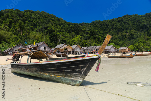 The Moken Sea Gypsy Village at Koh Surin Tai in the Mu Ko National Park, Surin Islands of Thailand with its thatched houses on stilts.