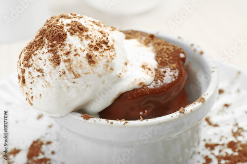 Chocolate lava cake with ice-cream on the table, close-up