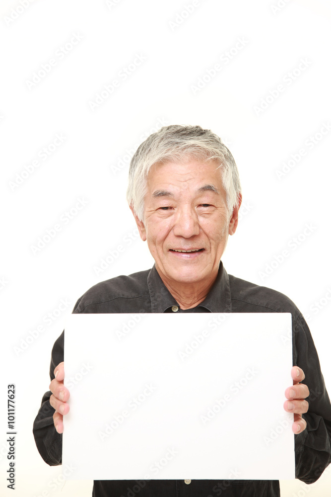 senior Japanese man with message board senior Japanese man with message board