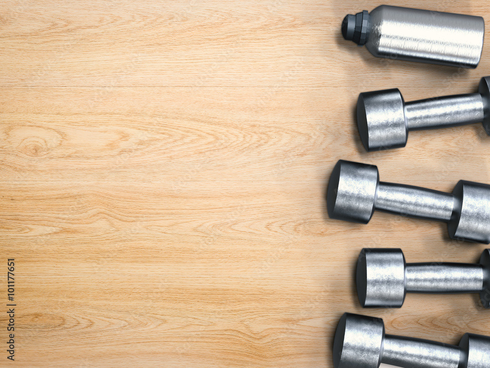 3d rendered metal dumbbells on wooden floor 3d rendered metal dumbbells on wooden floor