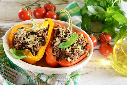 Stuffed peppers with meat, rice and mushrooms photo