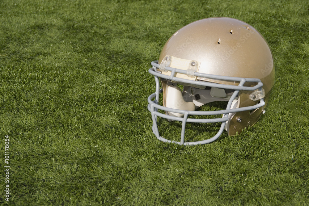 Naklejka Football Helmet on Artificial Turf