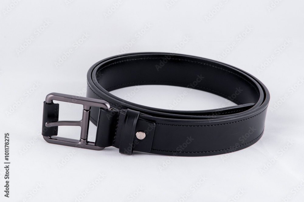 Black leather belt isolated on white background Black leather belt isolated on white background