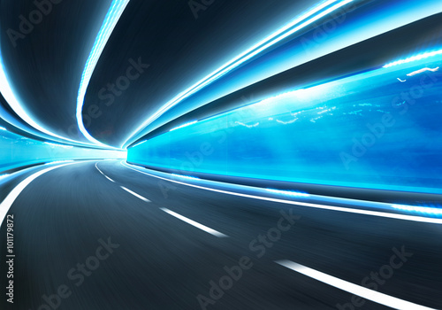 Abstract blurred speed motion road in glass tunnel underwater