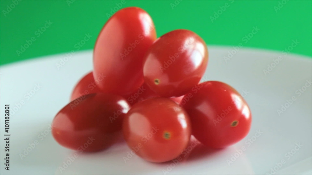 pile of cherry tomatoes on rotating plate pile of cherry tomatoes on rotating plate