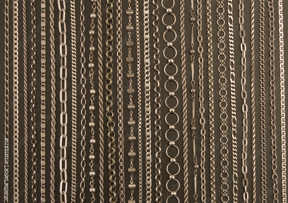 line pattern with clos up old silver chains on black background line pattern with clos up old silver chains on black background