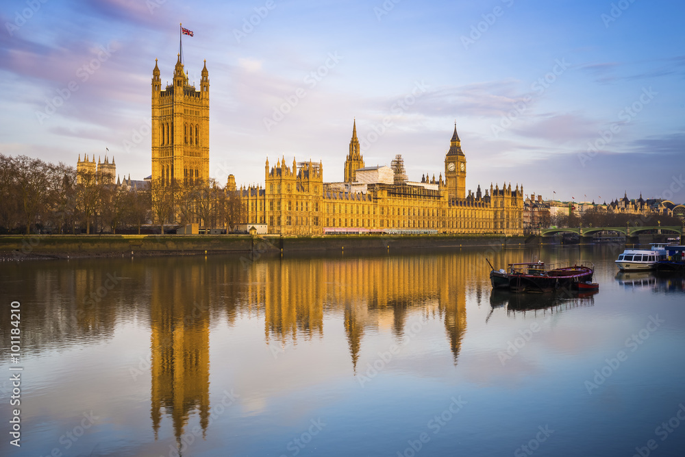 Houses of parliament and Big Ben and Westminster on a sunny early morning - London, UK
