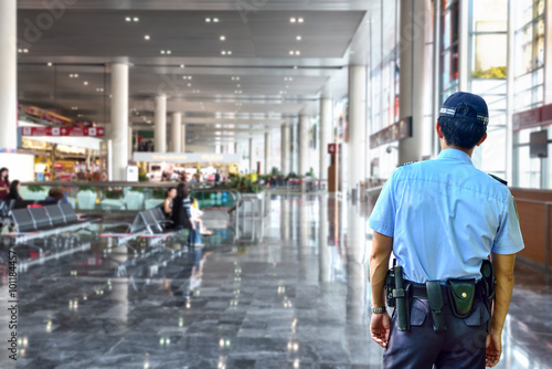 Security guard in airport photo