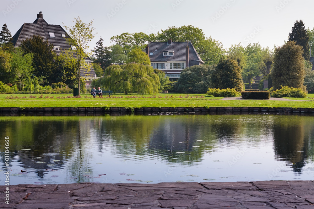 Fototapeta premium Couple Sitting In The Park