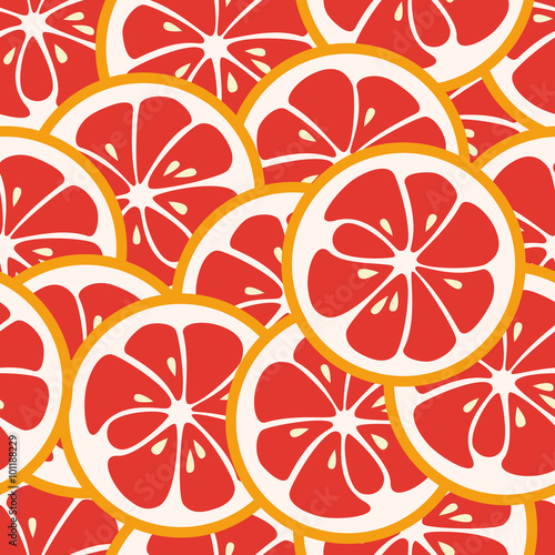Cute seamless pattern with red grapefruit slices