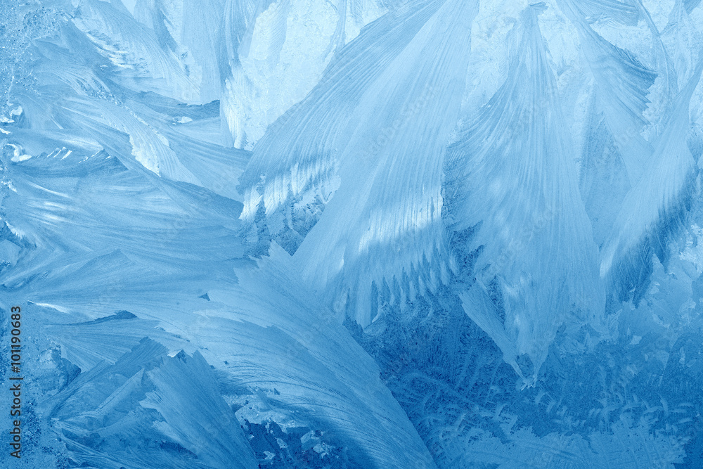 Frost patterns on window glass in winter. Frosted Glass Texture. Blue Frost patterns on window glass in winter. Frosted Glass Texture. Blue