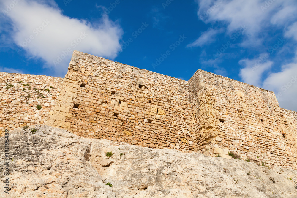 Facade of medieval fortress. Calafell, Spain