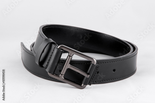 Black leather belt isolated on white background