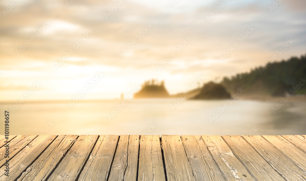 empty wooden deck table top Ready for product display montage with sea sunset background.