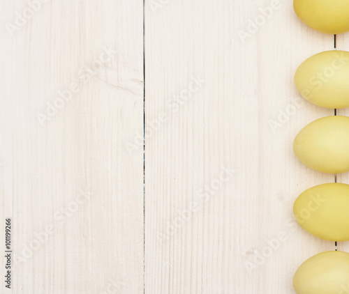 Abundance of yellow eggs in a row