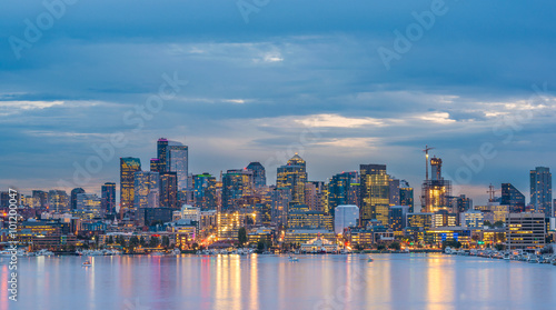 scenic view of Seattle cityscape in the night time with reflection in the water Washington usa.