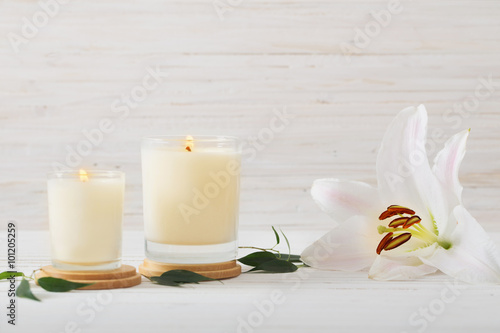 scented candles on white background