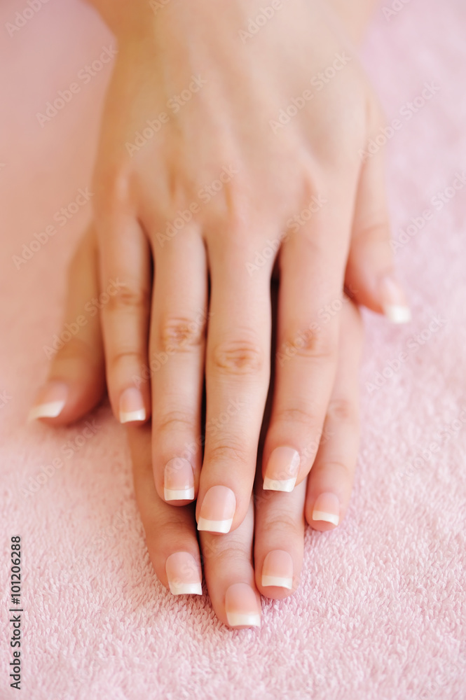 Naklejka premium Woman hands with beautiful french manicure