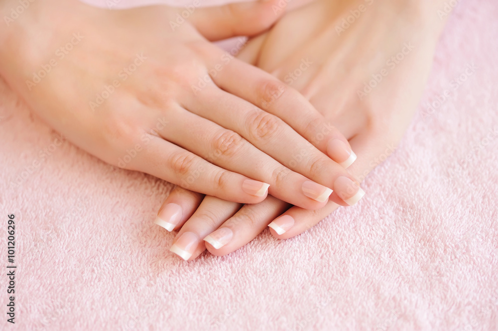 Naklejka premium Woman hands with beautiful french manicure