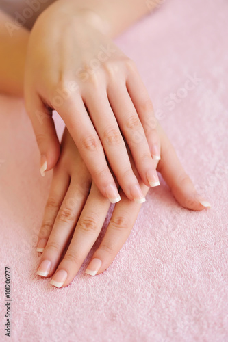 Woman hands with beautiful french manicure