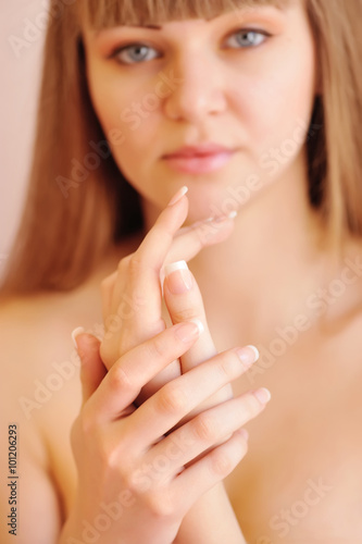 Care for beautiful woman hands. Focus on hands
