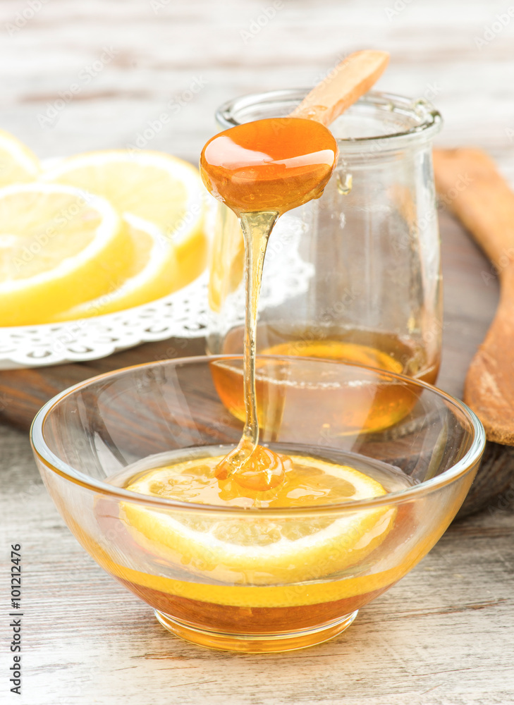 still life of honey and lemon still life of honey and lemon