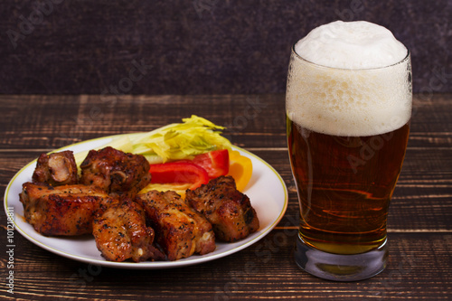 Glass of Beer, Pork Ribs and Vegetables